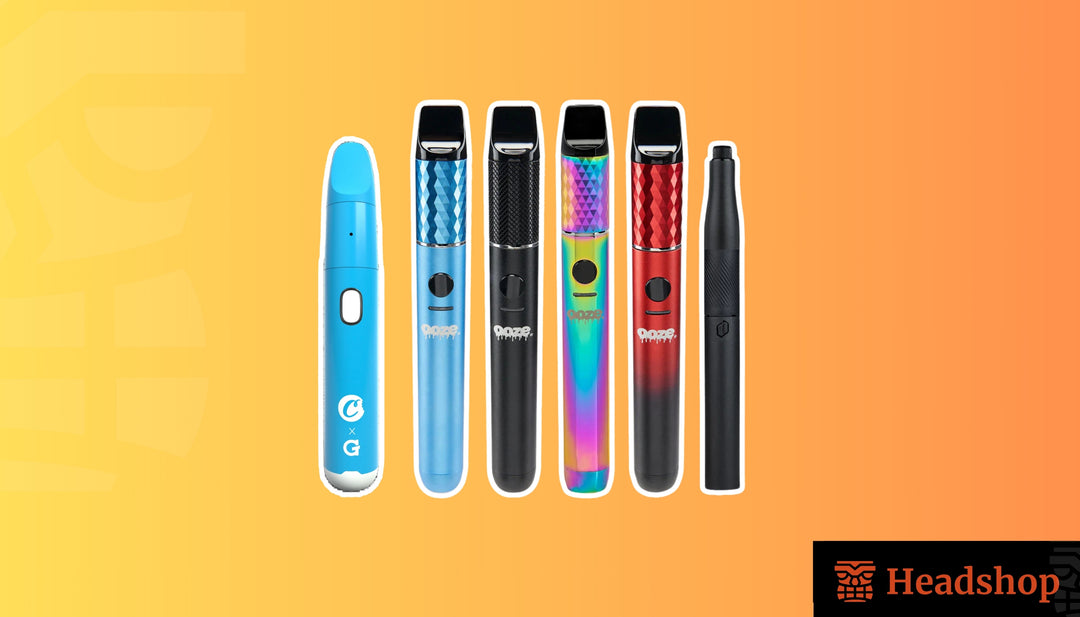 A person holding a vape pen next to a cozy fireplace.