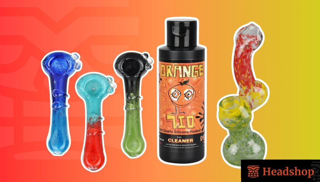 A clean weed pipe surrounded by cleaning supplies on a marble countertop.
