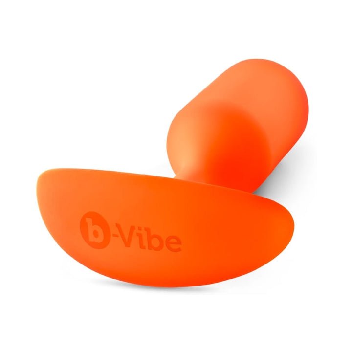 b-Vibe Snug Plug 3 Weighted Silicone Anal Plug Orange - Headshop.com